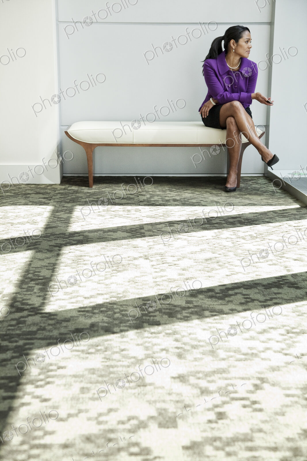 Black businesswoman in lobby of large business center