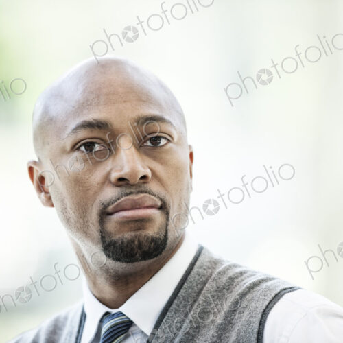 Black man business person in a business center.