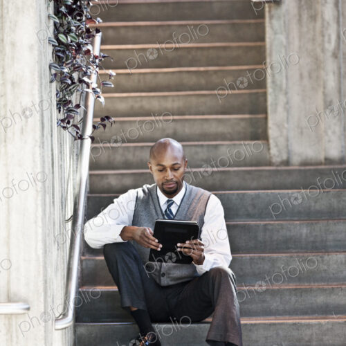 Black man business person in a business center.