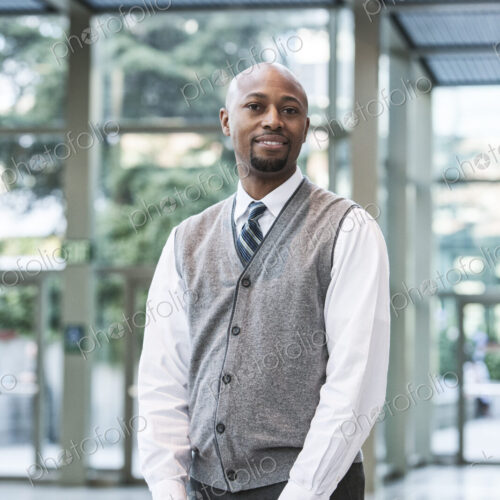 Black man business person in a business center. Black man business person in a business center.