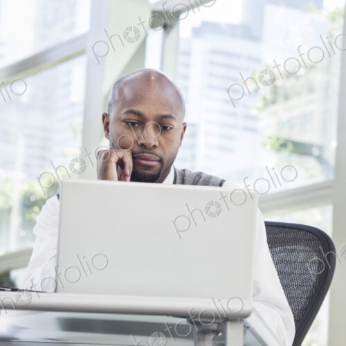 Black man business person in a business center.