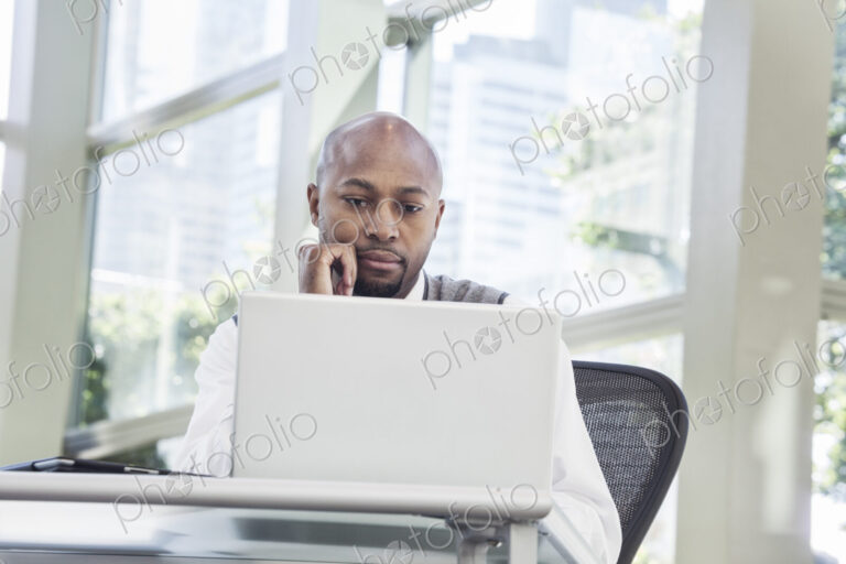 Black man business person in a business center.