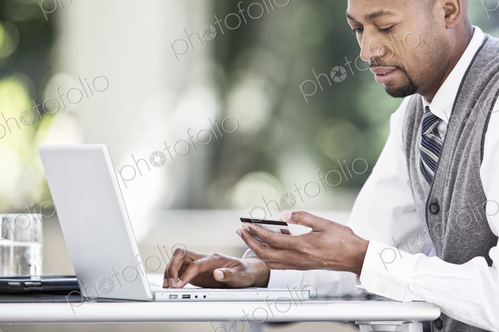 Black man business person in a business center.