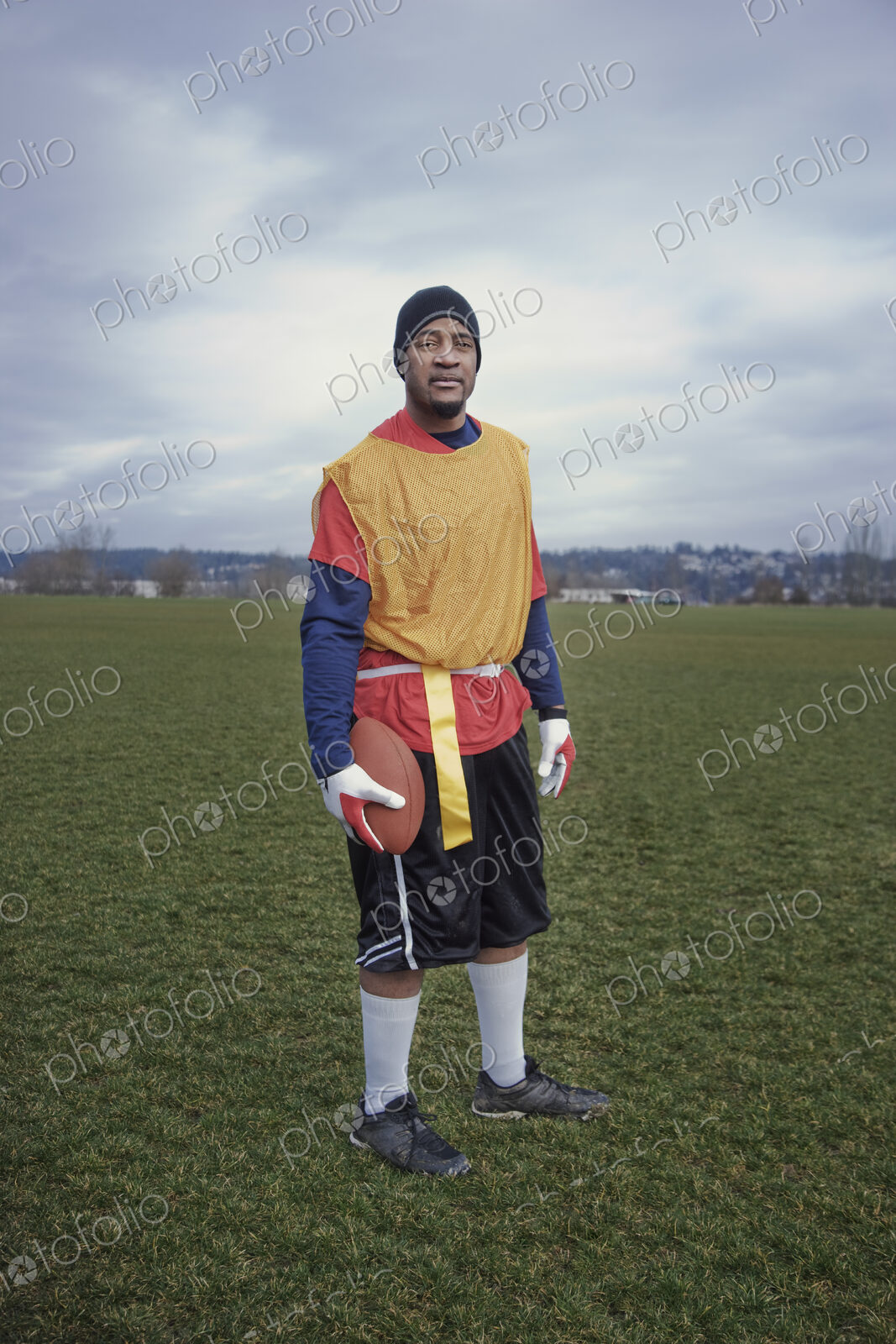 Black man member of an American flag football team.