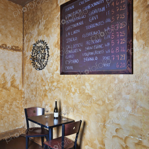 Blackboard and table in wine bar Blackboard and table in wine bar