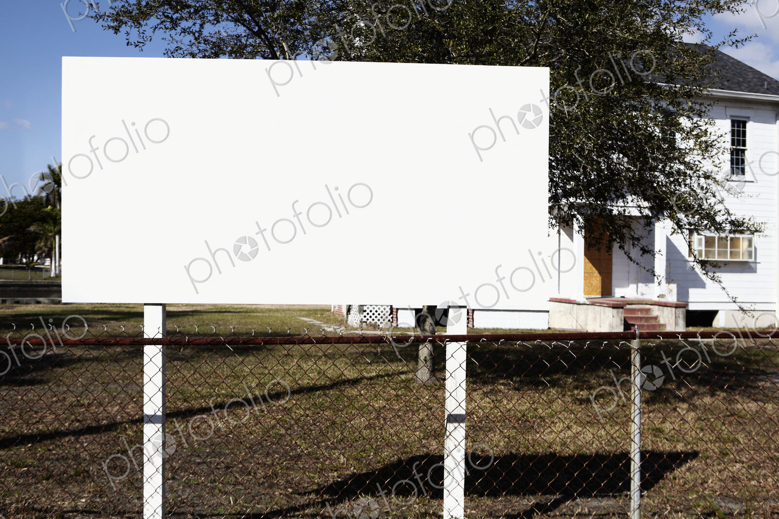 Blank Billboard on a Lawn