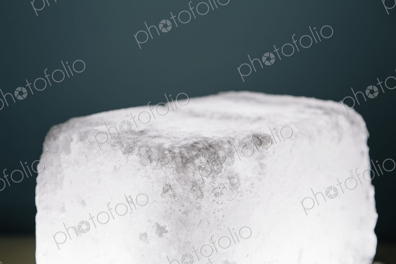 Block of ice or an ice cube, close up.