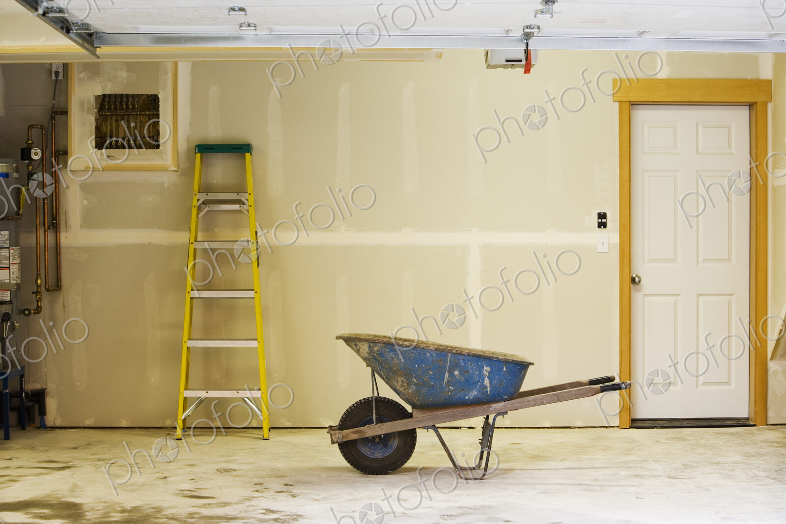 Blue Wheelbarrow in Garage