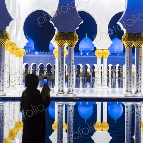 Blue and white Sheikh Zayed Mosque at dusk, Abu Dhabi, United Arab Emirates. Blue and white Sheikh Zayed Mosque at dusk, Abu Dhabi, United Arab Emirates.