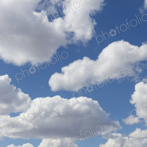 Blue sky and small cumulus clouds in the sky.