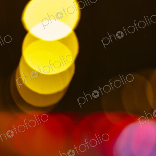 Blurred headlights and tail lights at night, abstract patterns. Blurred headlights and tail lights at night, abstract patterns.