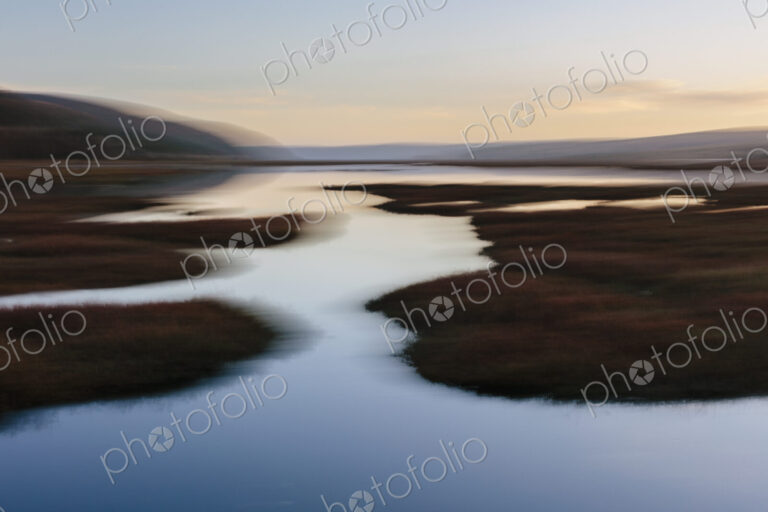 Blurred motion abstract of estuary and wetlands
