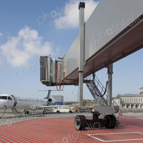 Boarding Bridge Leading to a Parked Plane Boarding Bridge Leading to a Parked Plane