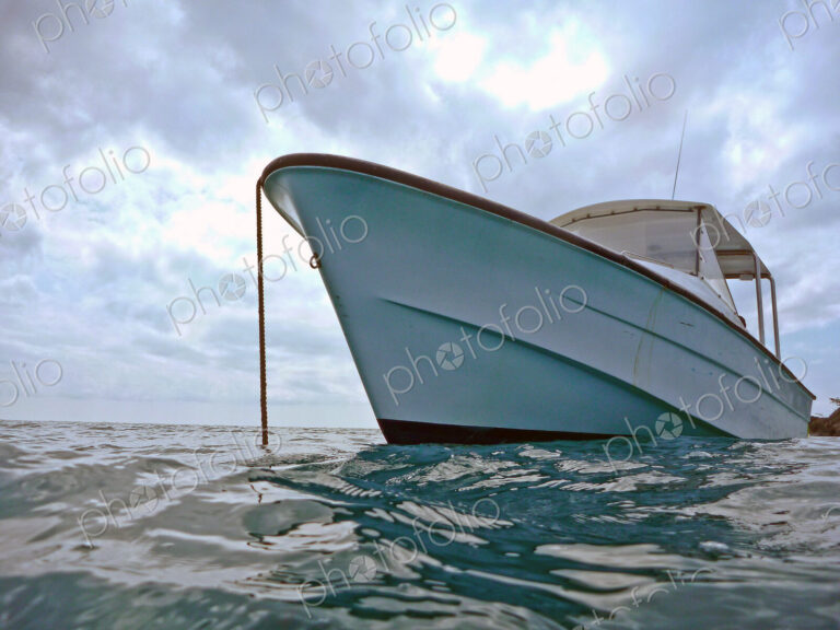 Boat Anchored In Water
