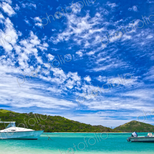Boats at a Tropical Beach Boats at a Tropical Beach