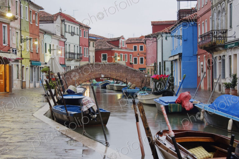 Boats in Burano Canal During a Rain Shower