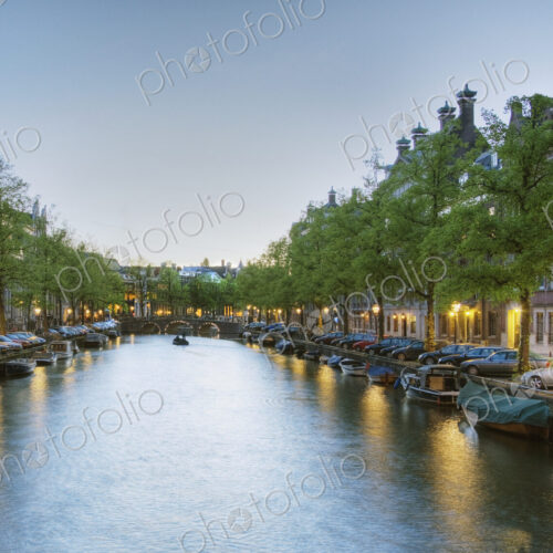 Boats in a Tree Lined Canal at Dusk