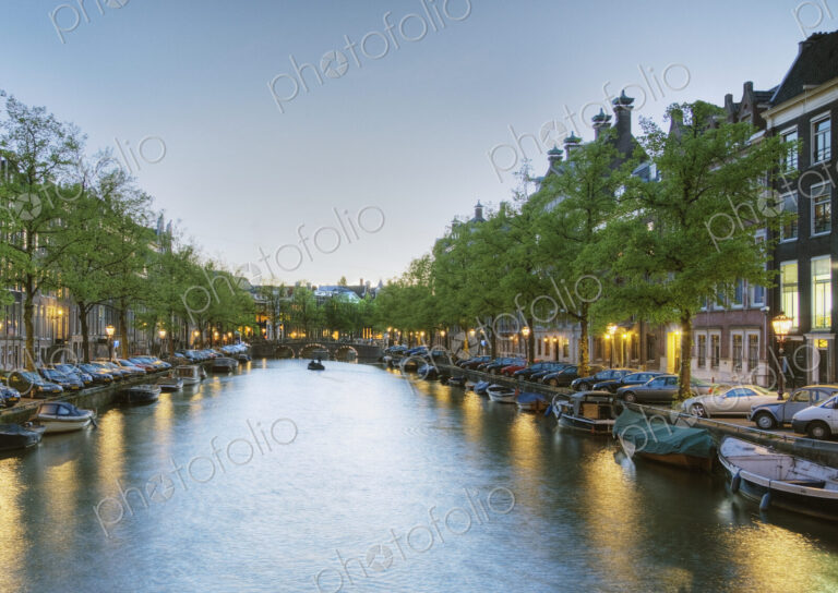 Boats in a Tree Lined Canal at Dusk