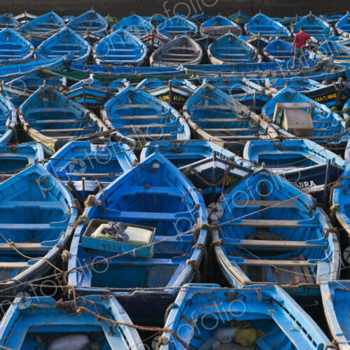 Boats moored very close together in the harbor of Essaouira, Morocco Boats moored very close together in the harbor of Essaouira, Morocco