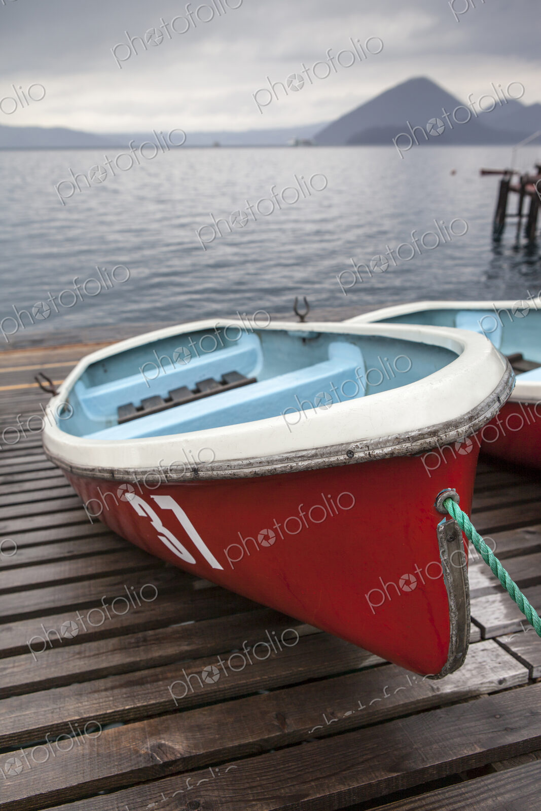 Boats on wooden dock