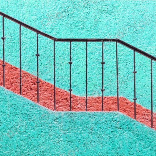 Bold turquoise wall with red stripe and iron railing in Cancun, Mexico. A vibrant,… Bold turquoise wall with red stripe and iron railing in Cancun, Mexico. A vibrant,…