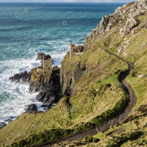 Botallack Crown Mines, view down onto ruined mine workings and wheel house on the… Botallack Crown Mines, view down onto ruined mine workings and wheel house on the…