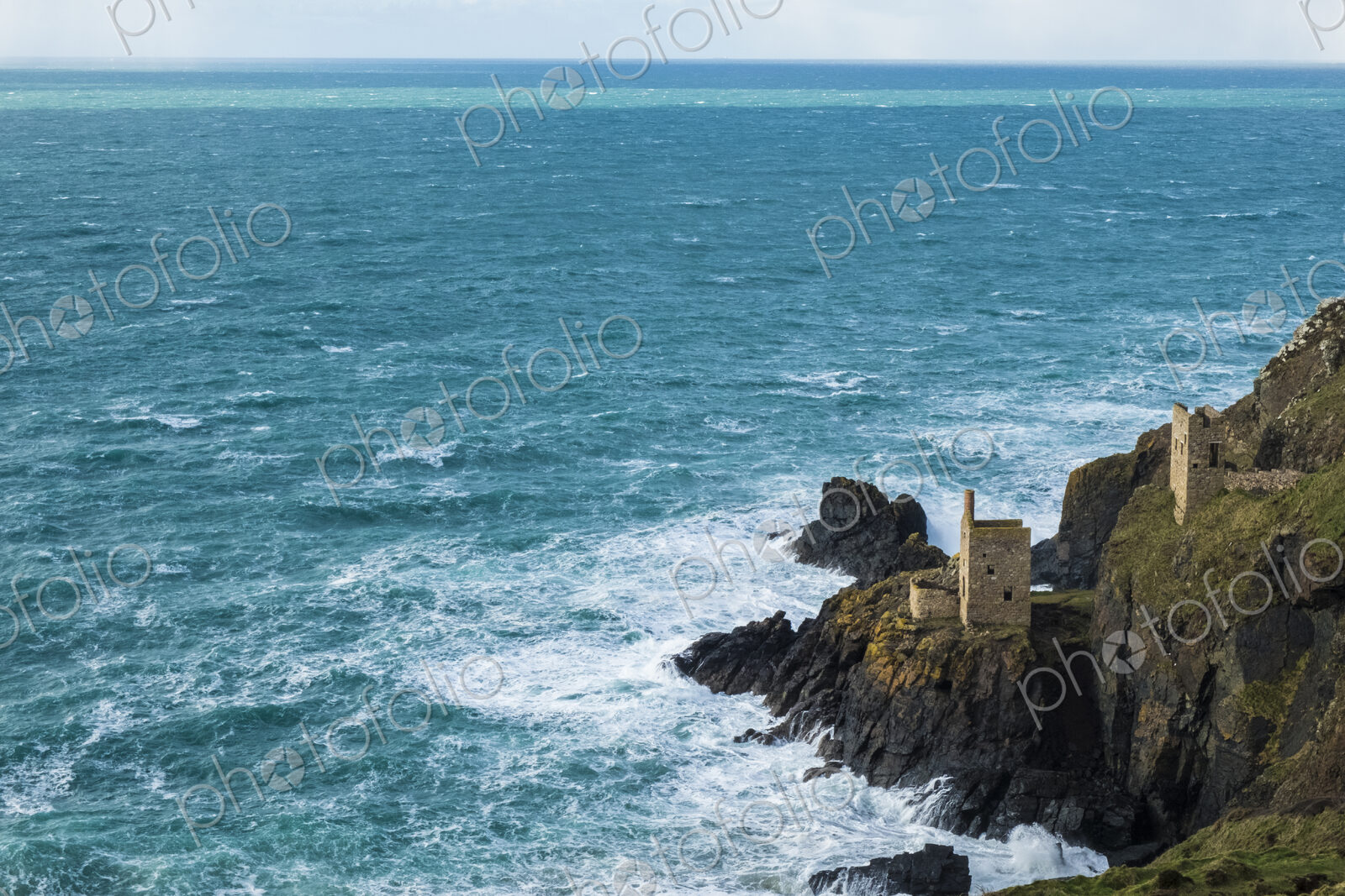 Botallack Crown Mines, view down onto ruined mine workings and wheel house on the…