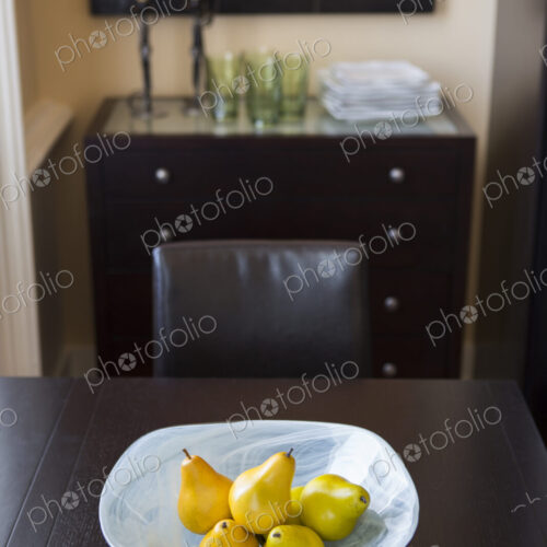 Bowl of fruit on dining room table Bowl of fruit on dining room table