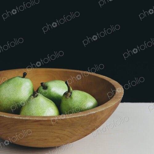 Bowl of green Anjou pears