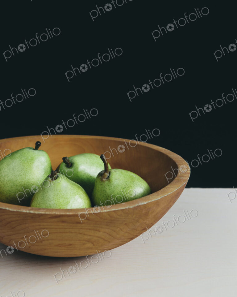 Bowl of green Anjou pears