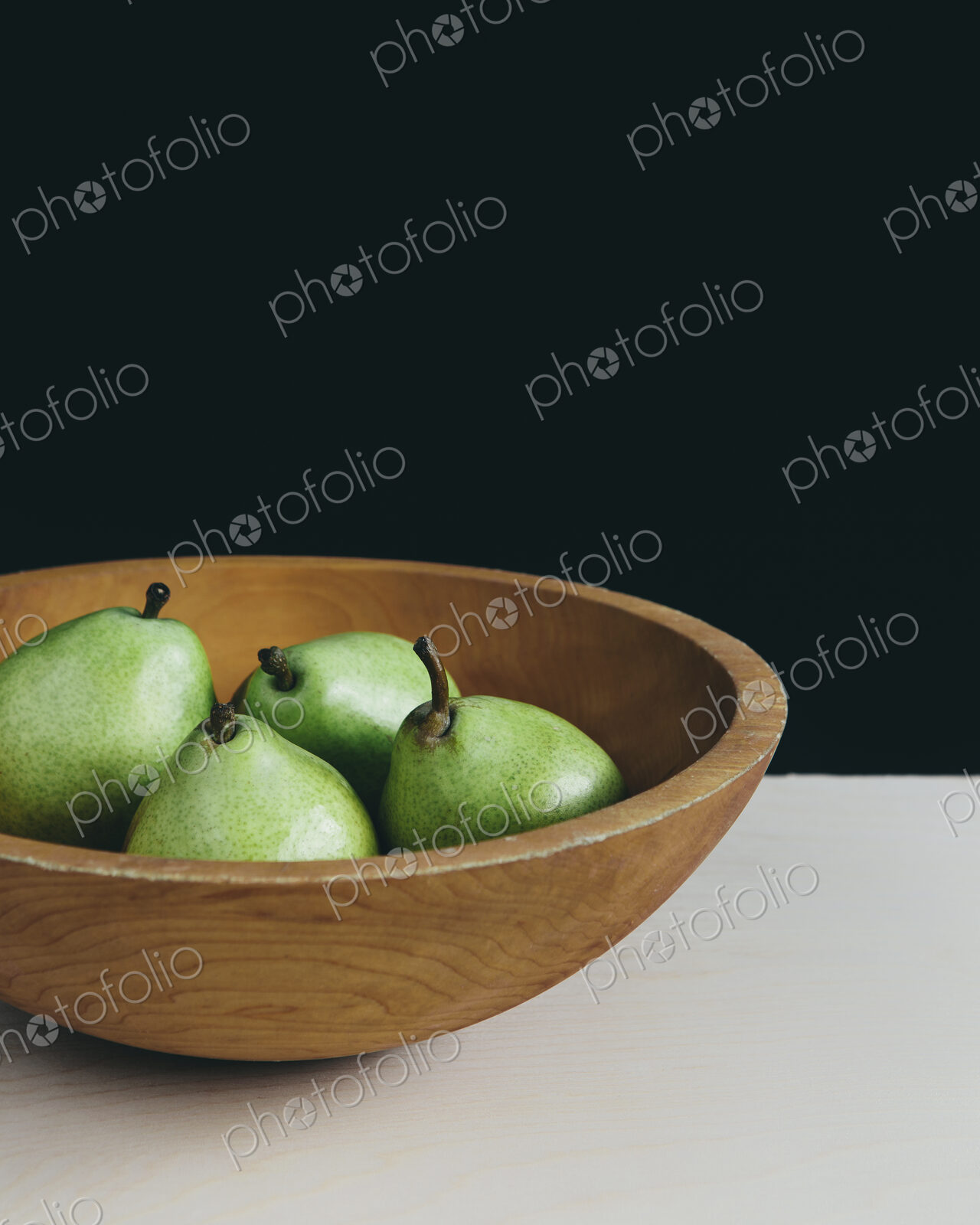 Bowl of green Anjou pears