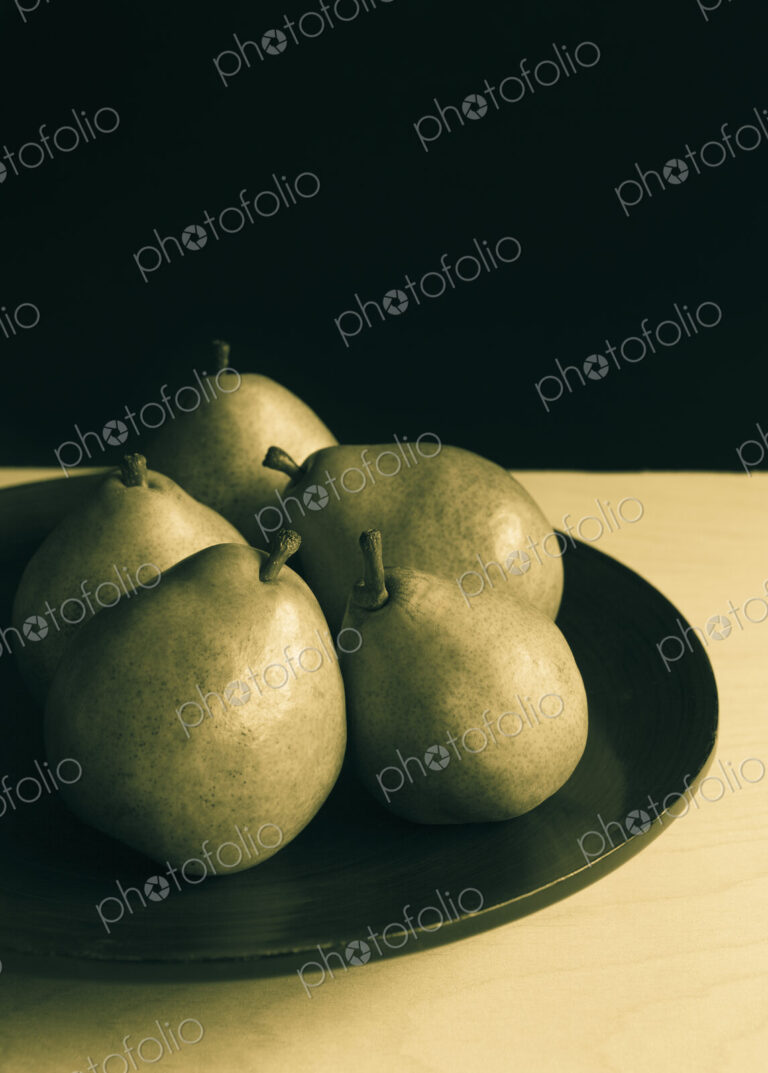 Bowl of green Anjou pears