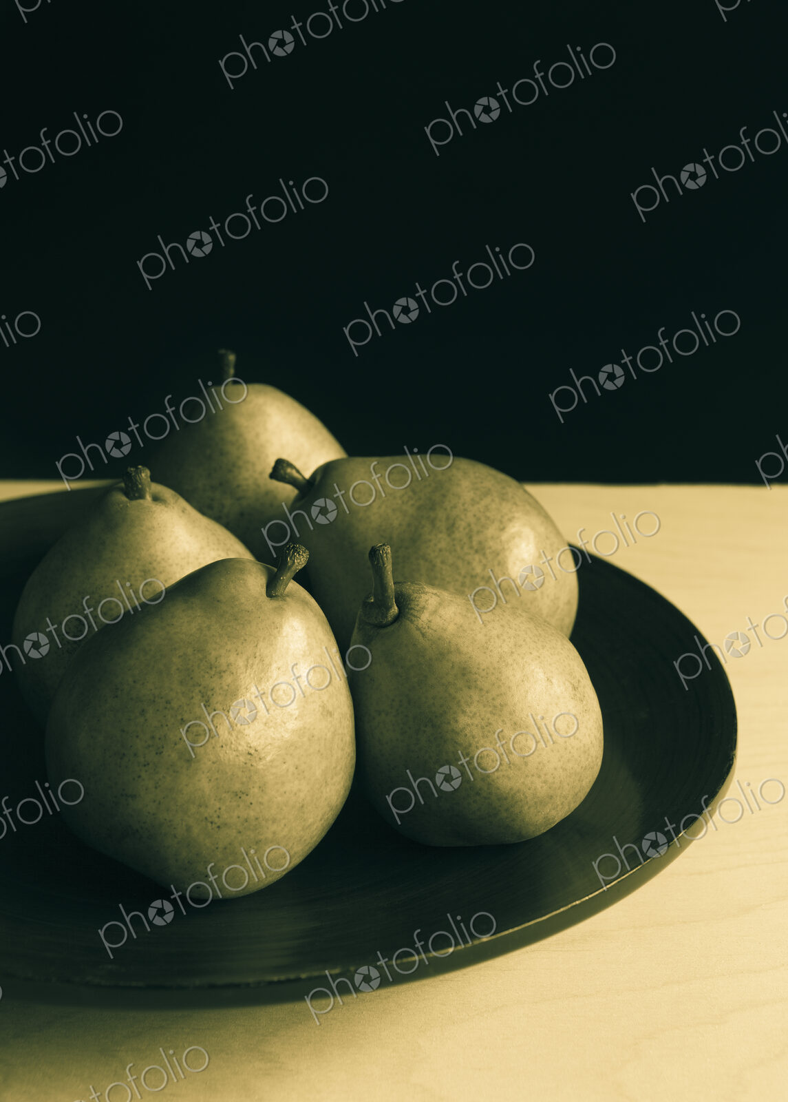 Bowl of green Anjou pears