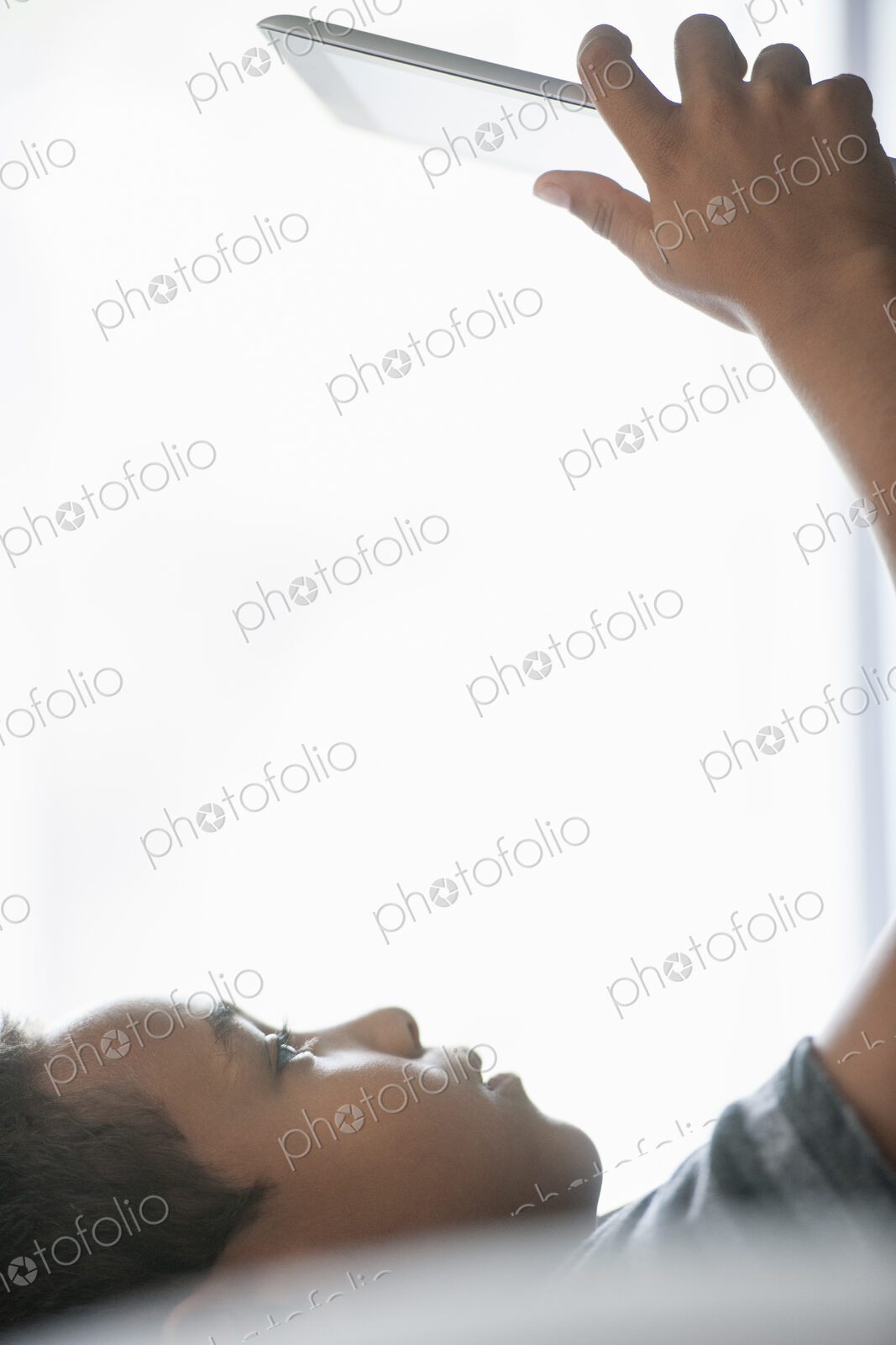 Boy using a tablet.