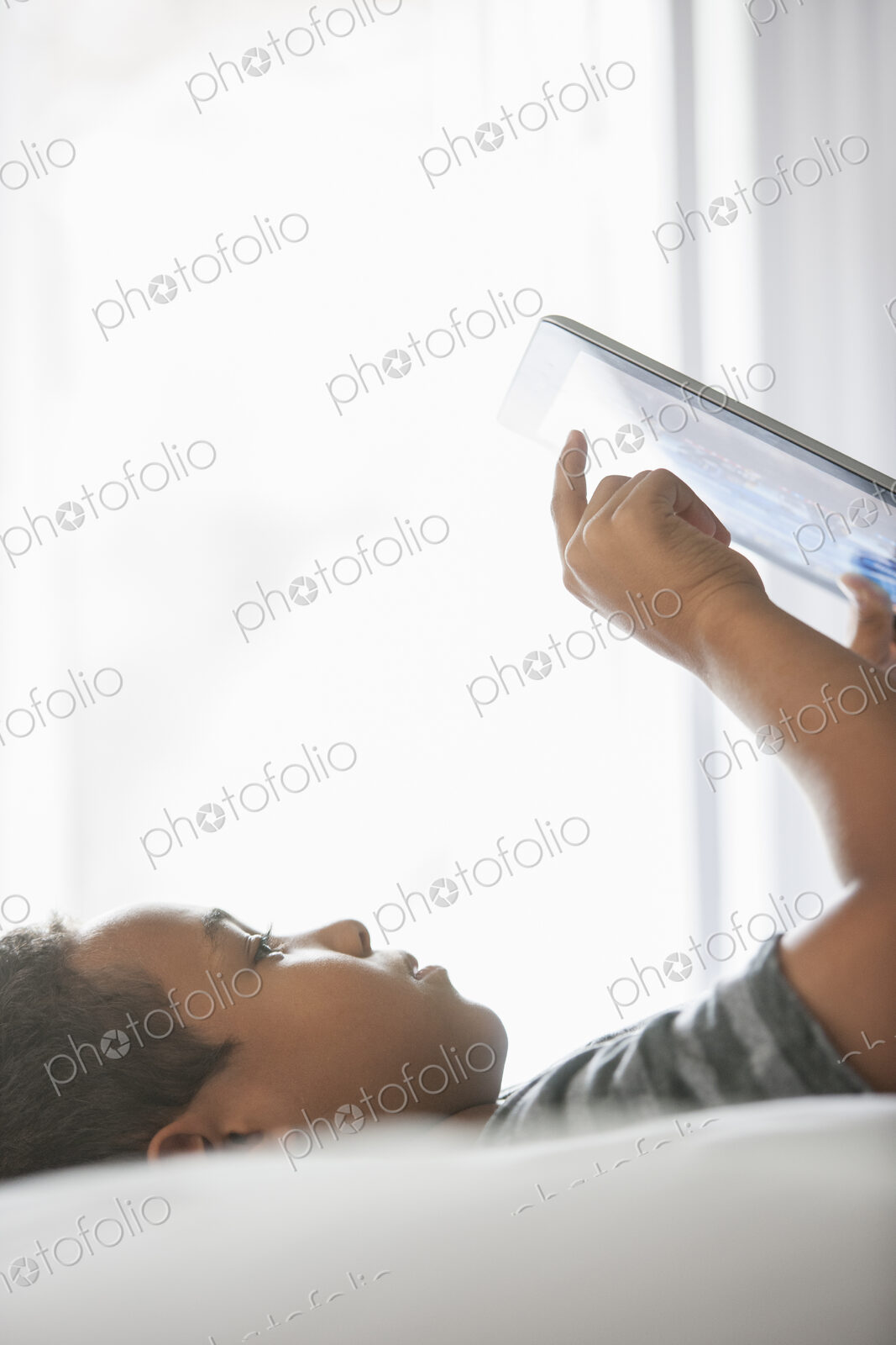 Boy using a tablet.