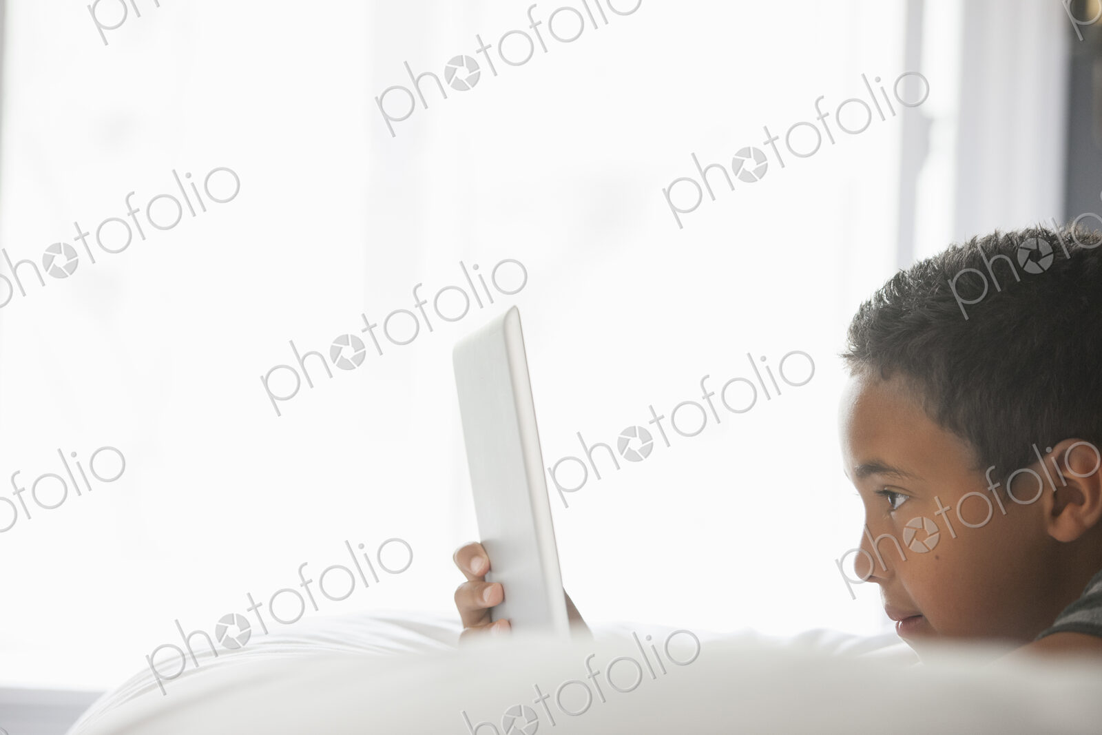Boy using a tablet.