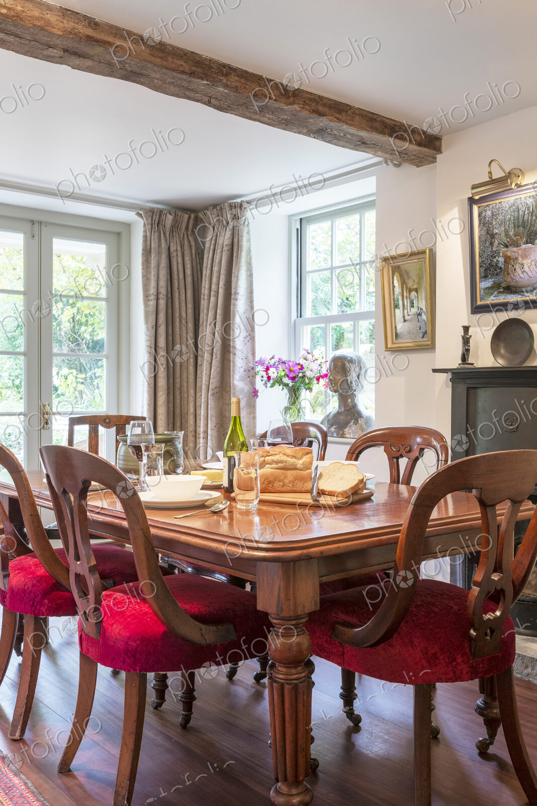 Bread and cutting board on dining table
