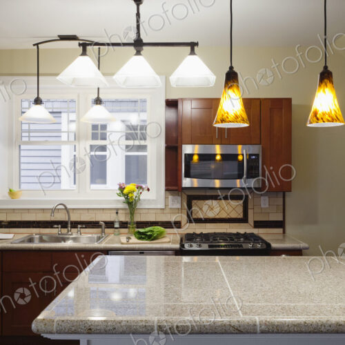 Breakfast bar and cabinets in kitchen Breakfast bar and cabinets in kitchen