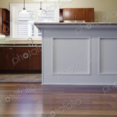 Breakfast bar and cabinets in kitchen Breakfast bar and cabinets in kitchen