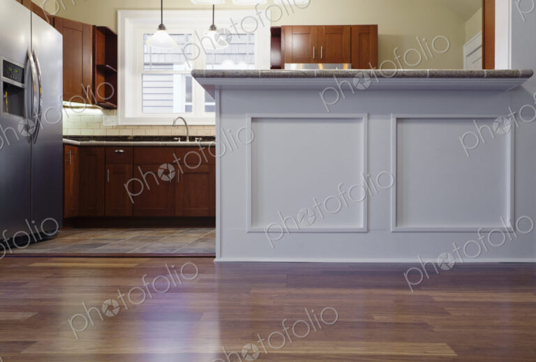 Breakfast bar and cabinets in kitchen