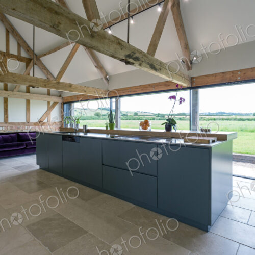 Breakfast bar and glass wall in modern kitchen