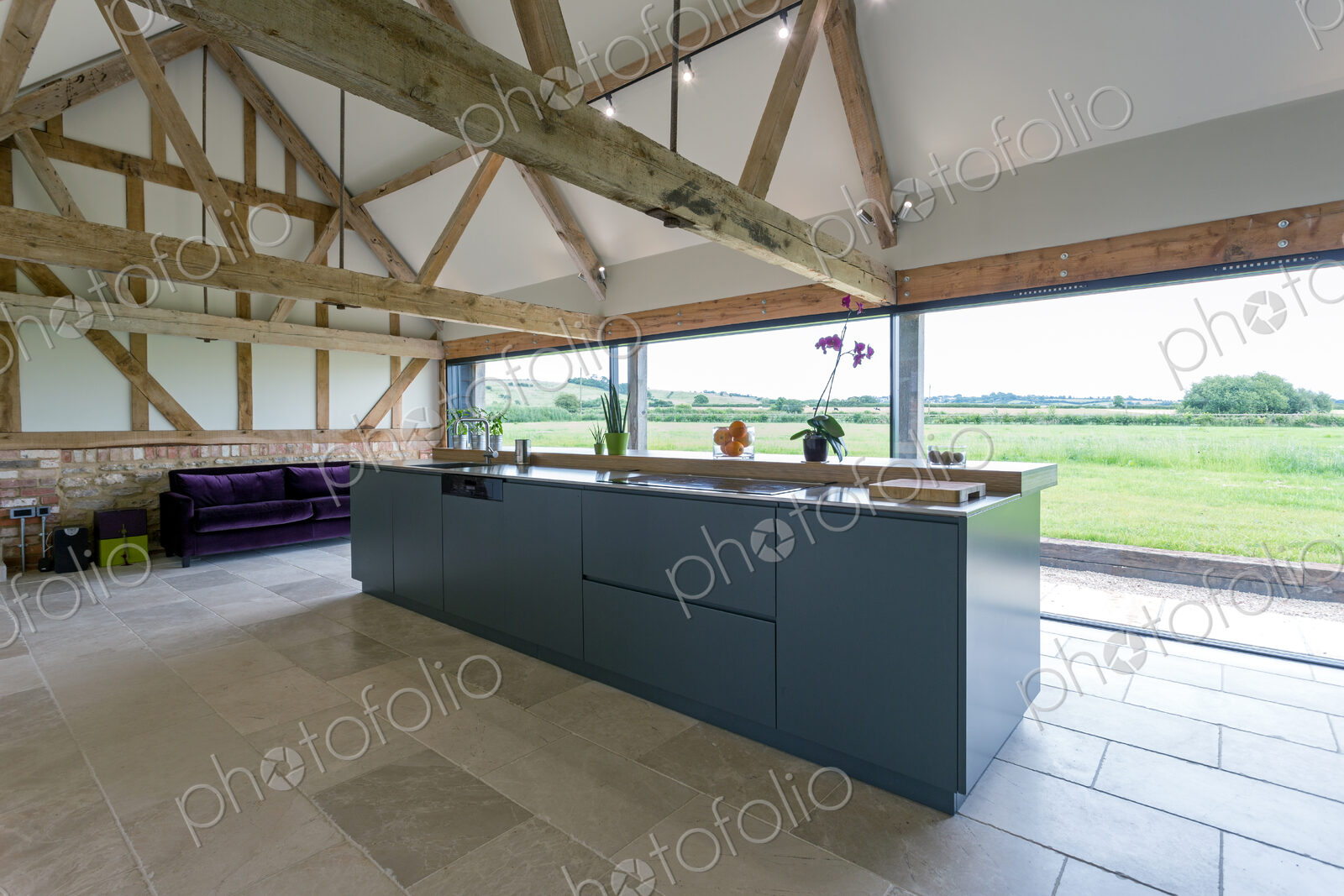 Breakfast bar and glass wall in modern kitchen