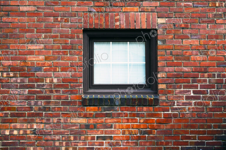 Brick wall of building with window
