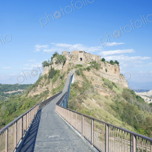 Bridge to the hilltop historic buildings of the fort of Civita di Bagnoregio, founded… Bridge to the hilltop historic buildings of the fort of Civita di Bagnoregio, founded…
