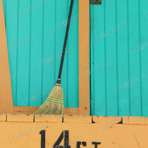Broom Standing at Back of Lifeguard Station Broom Standing at Back of Lifeguard Station