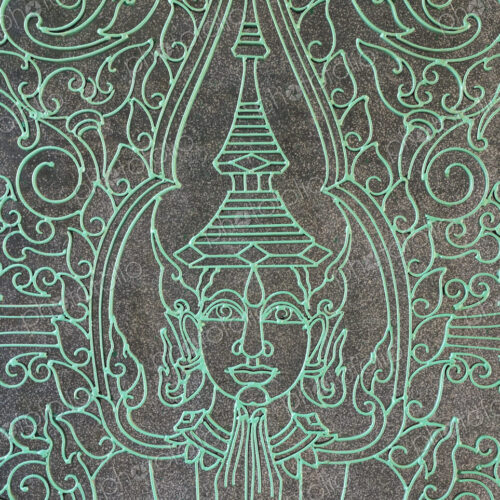 Buddha figure engraved into the Victory Gate at the Royal Palace. Buddha figure engraved into the Victory Gate at the Royal Palace.