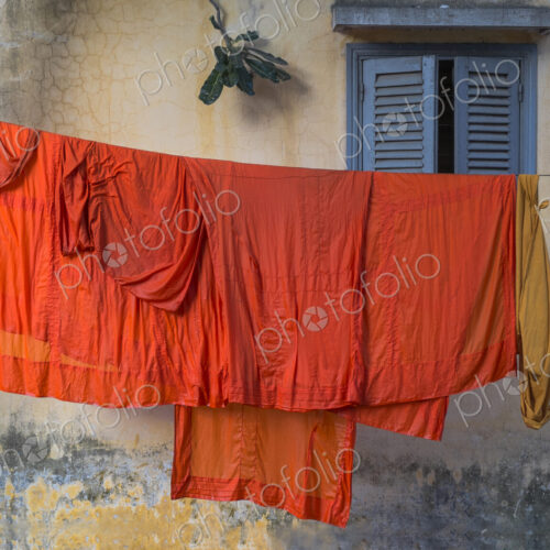 Buddhist monk robes hanging on clothesline