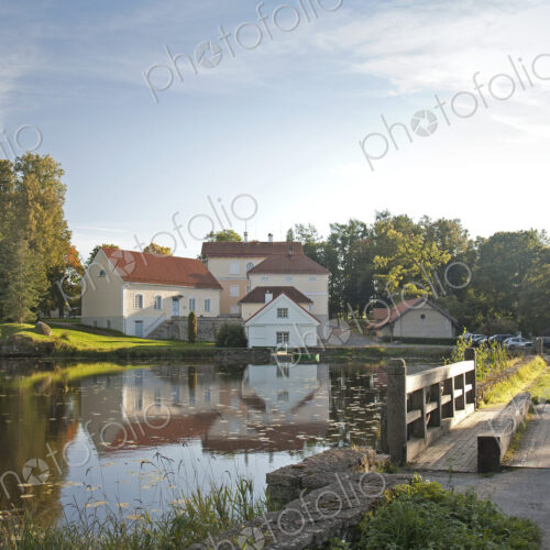 Buildings Overlooking a Calm Pond Buildings Overlooking a Calm Pond