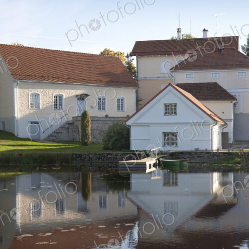 Buildings Overlooking a Calm Pond Buildings Overlooking a Calm Pond