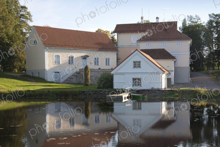 Buildings Overlooking a Calm Pond